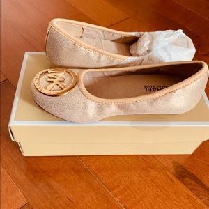Michael Kors girl’s gold flats
